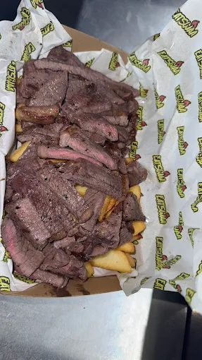 Steak loaded fries in branded wrapper